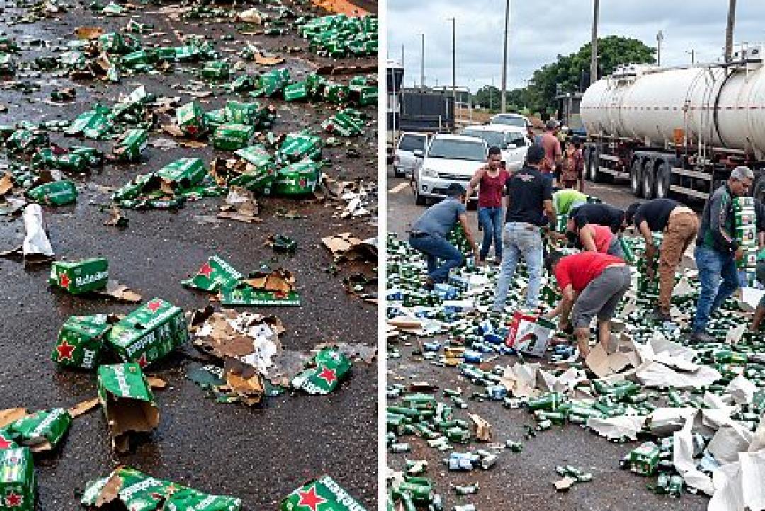 Caminhão carregado de Heineken tomba na MT-358 em Tangará da Serra e populares saqueiam carga