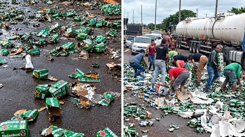 Caminhão carregado de Heineken tomba na MT-358 em Tangará da Serra e populares saqueiam carga